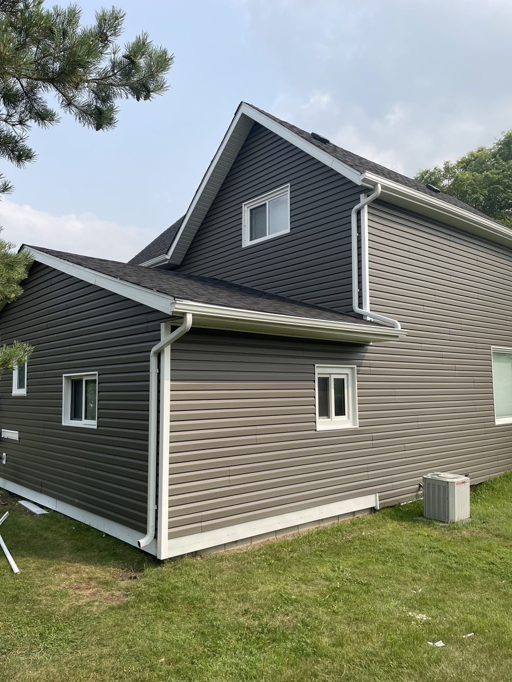 Two-tone vinyl siding on a Westman home